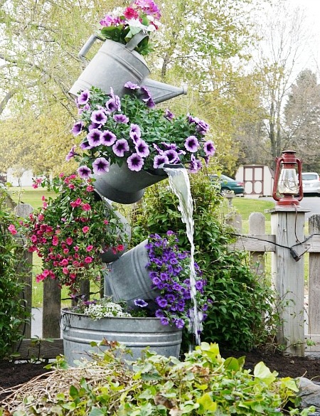 Galvanized Tipsy Pots.